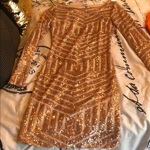 Rose gold sequin dress.